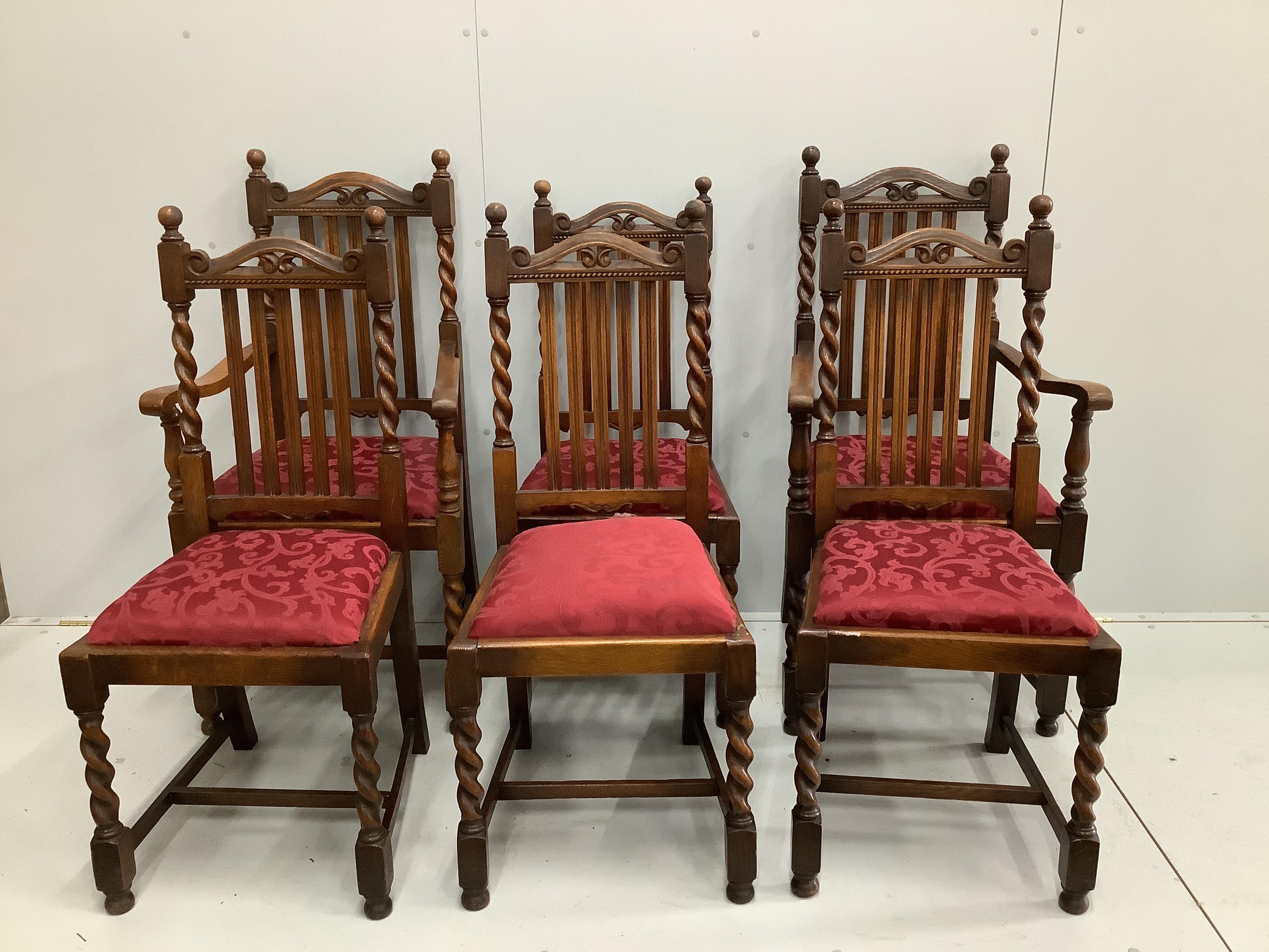 A Jacobean Revival parquetry inlaid rectangular oak draw leaf dining table, 220cm extended, depth 94cm, height 78cm together with six 1920's oak dining chairs, two with arms